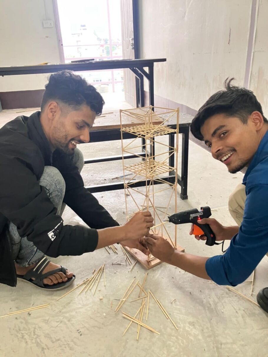 Students constructing models for shake table